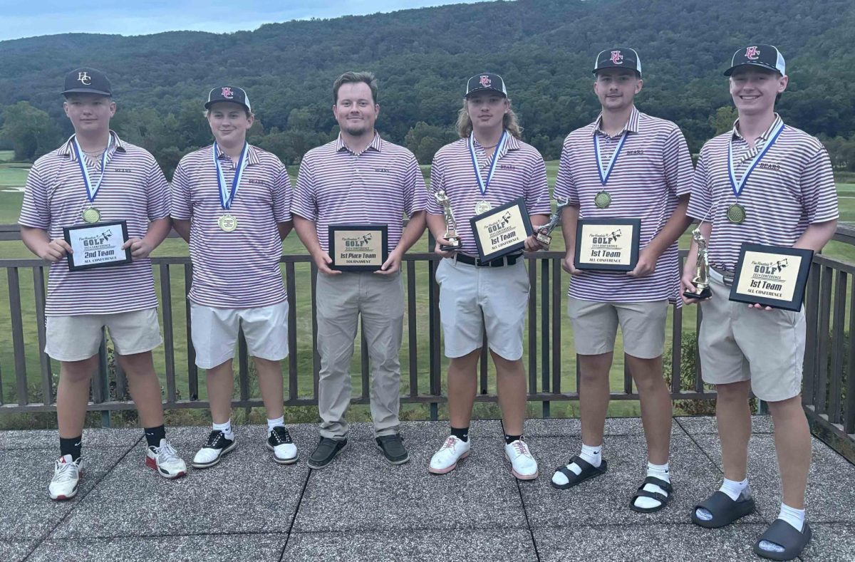 Harlan County won the Pine Mountain Golf Conference league tournament on Thursday in Pineville. Team members include, from left: Zayden Casolari, Carson Clark, coach Brendan Rutherford, Brayden Casolari, Alex Creech and Cole Cornett.