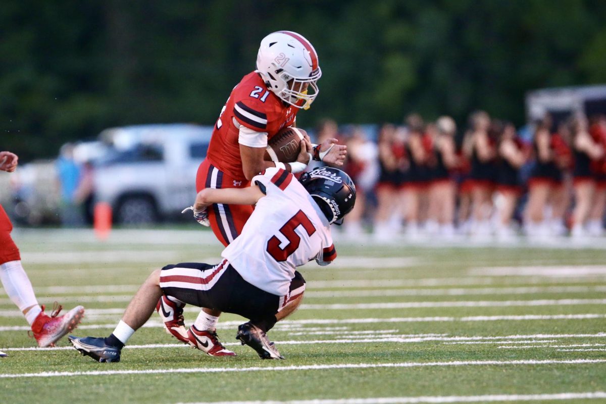 Harlan County defensive back Gage Bailey brought down a Whitley County ball carrier in Friday's game.