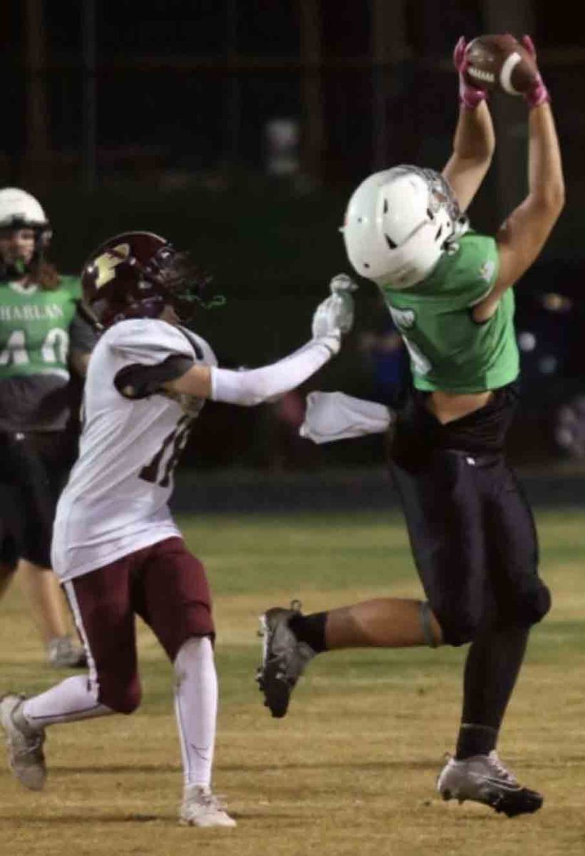 Harlan's Ryder Lemar caught a pass from Derek Holman during the Dragons' win over Pineville in middle school football action.