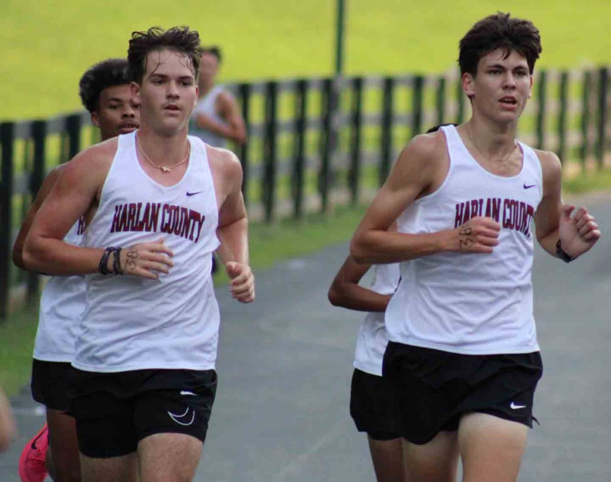 Harlan County seniors Evan Simpson (left) and Caleb Schwenke are pictured during Tuesday's race. The Black Bears finished second in the team results.