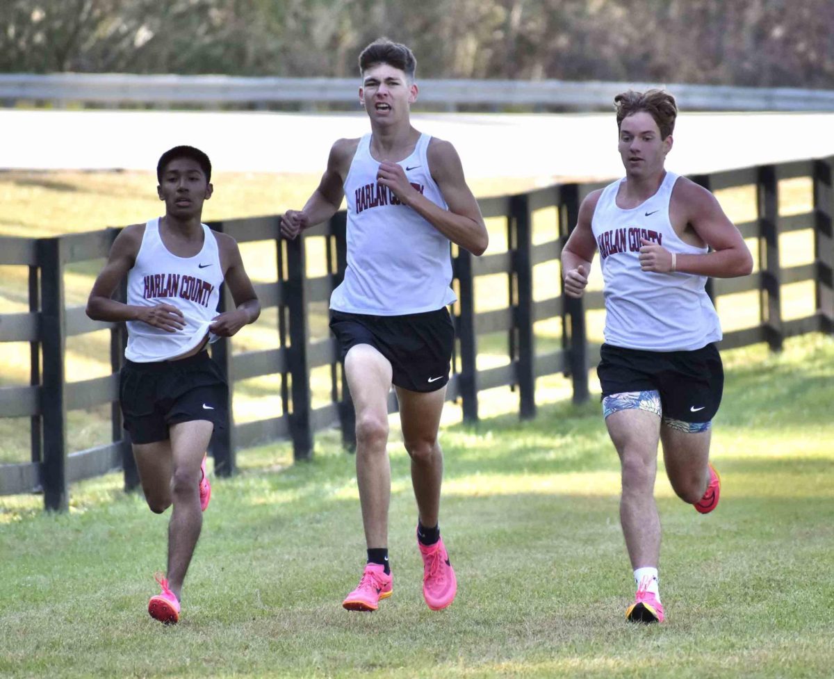 Jonavan RIgney, Caleb Schwenke and Ethan Simpson helped lead Harlan County to the Southeastern Kentucky Conference meet title on Tuesday at Leslie County.