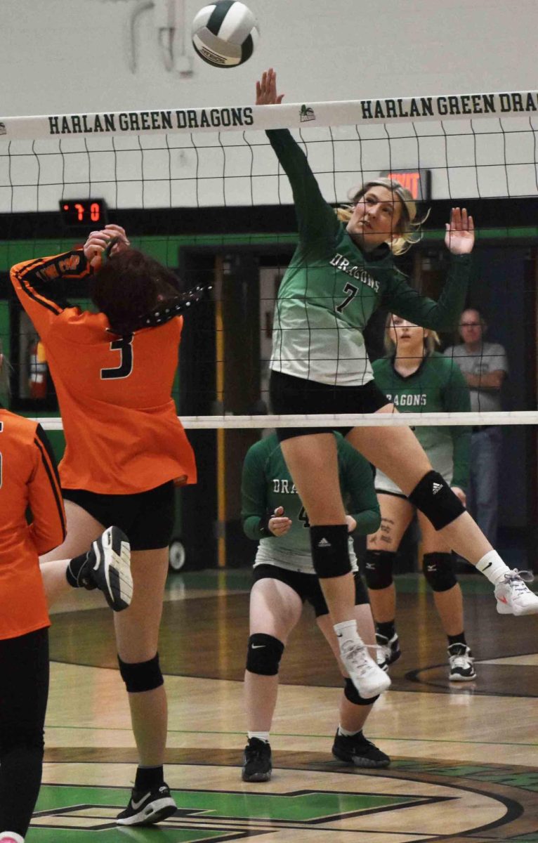 Harlan senior Kaylee Roark finished off a point during the Lady Dragons' win Tuesday over Lynn Camp.