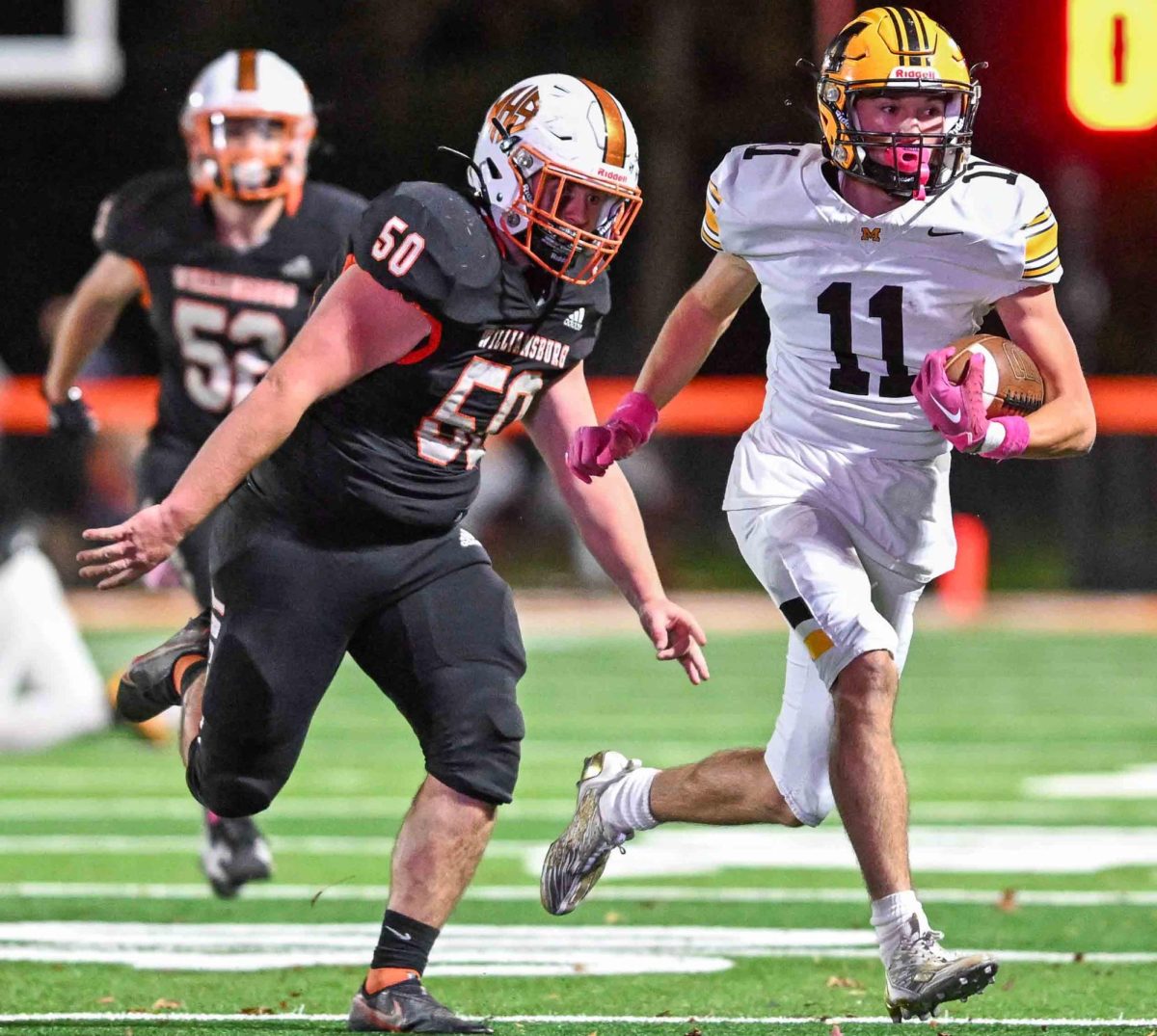 Middlesboro receiver Anthony Miracle picked up yardage after a catch in the Jackets' district loss to Williamsburg on Friday.