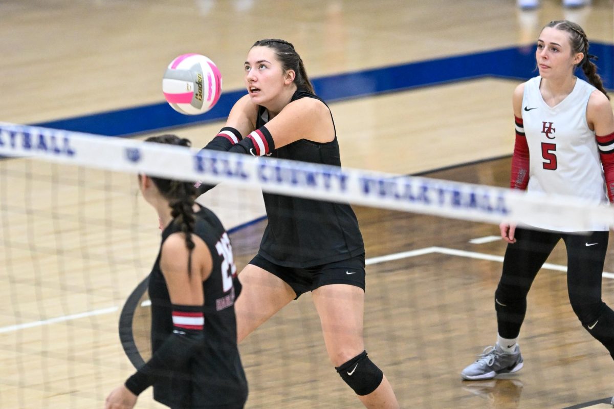 Harlan County's Kyliee Hoiska earned tournament most valuable players Tuesday as the Lady Bears defeated Bell County 25-19, 23-25, 25-18, 25-18 for the 52nd DIstrict Tournament title.