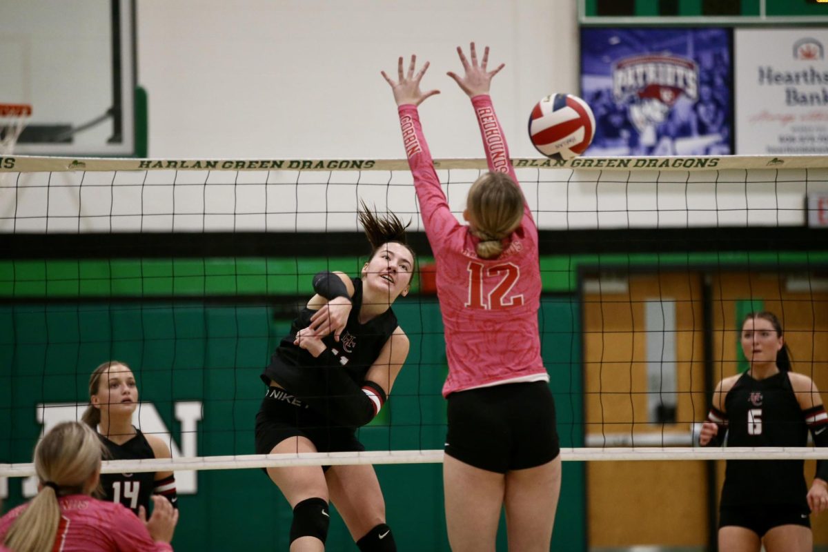 Harlan County's Kylee Hoiska finished off a point in 13th Region Tournament action Monday against Corbin.