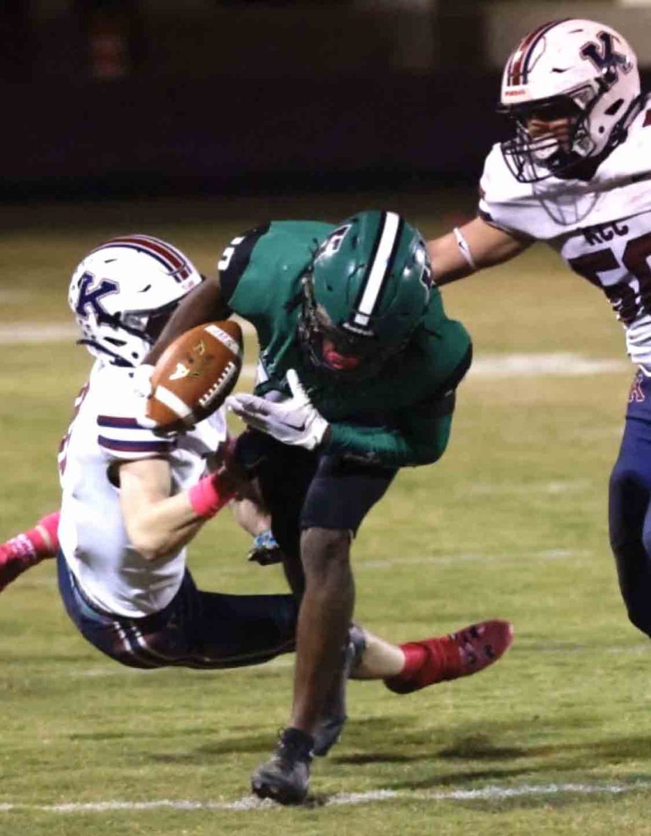 Harlan running back Darius Akal worked down the sideline in Friday's game against visiting Knott Central.