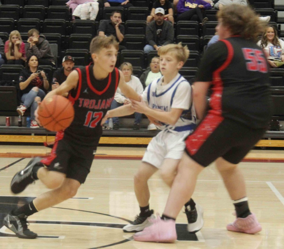 James A. Cawood guard Easton Engle worked around a Rosspoint defender with the help of a pick by Wynn Cooper in action from the county panorama Saturday.