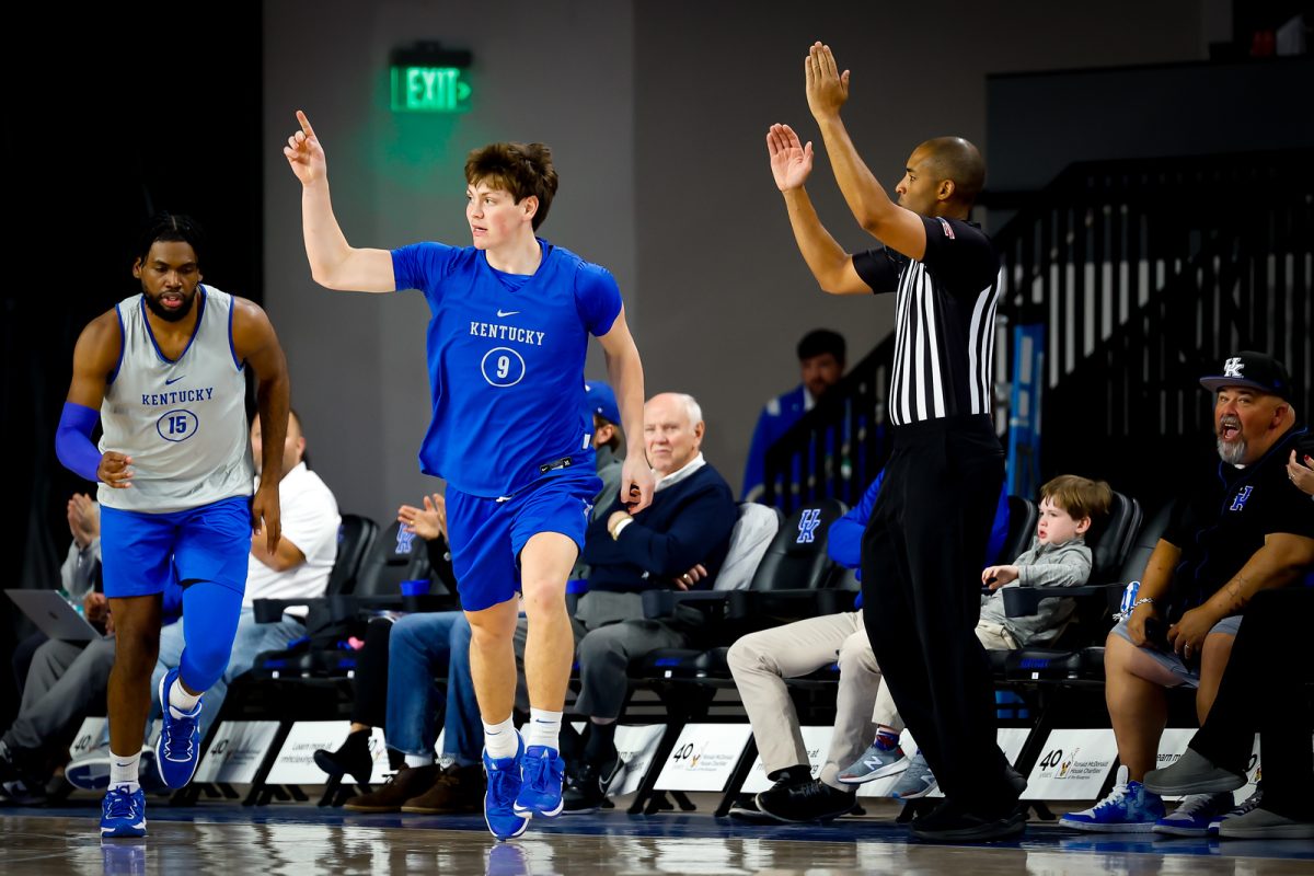 Trent Noah reacts after hitting a 3-pointer in the scrimmage.