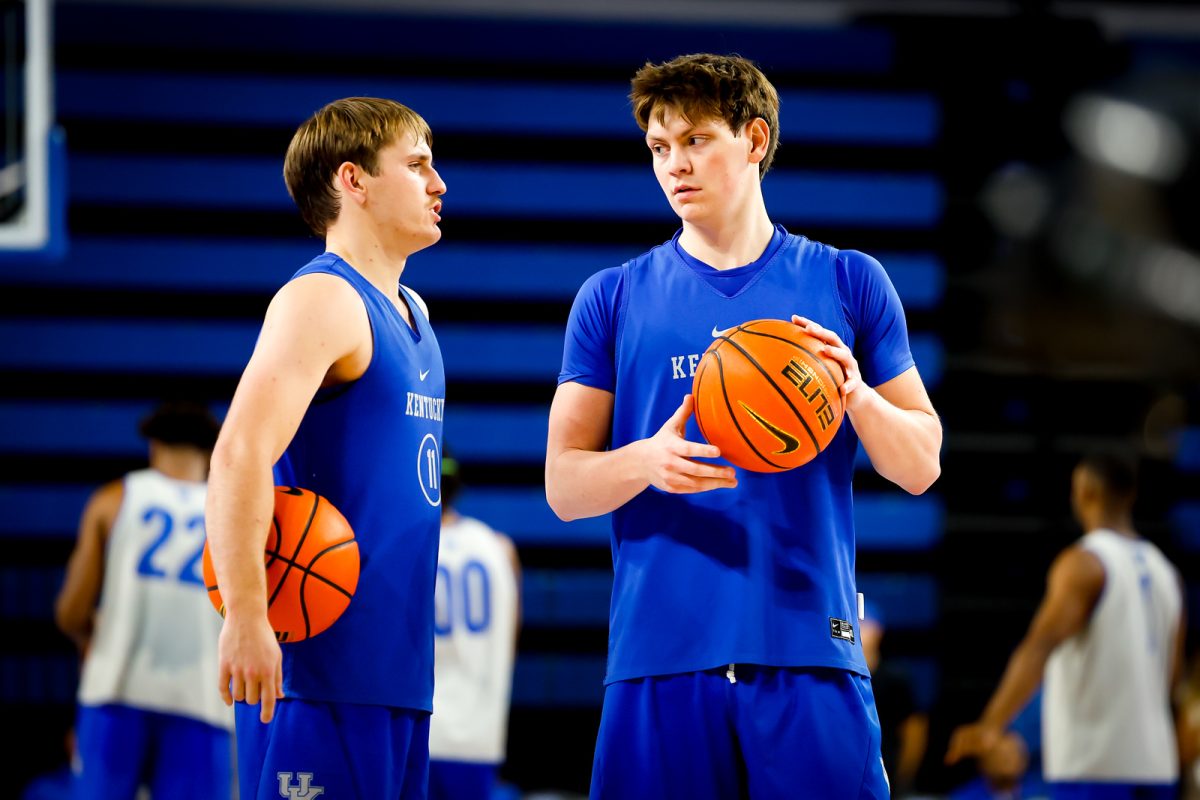 Trent Noah talked with Travis Perry before the scrimmage. Perry, from Lyon County, and Noah, from Harlan County, played against each other in last year's state championship game.