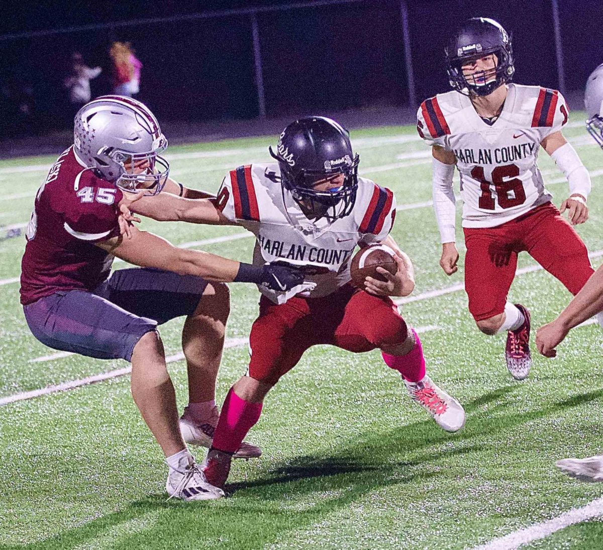 Harlan County's Jayce Brown battled to break away from a Pulaski County defender in Friday's game.