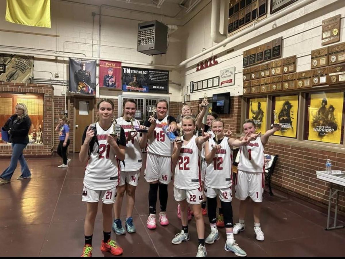 The Harlan Monarchs sixth-grade team includes Adleigh Creech, Crissalynn Jones, Jocelyn Miracle, Addy Cochran, Andrea Napier, Morgyn Belcher, Annie Burton and Reese Caudill.