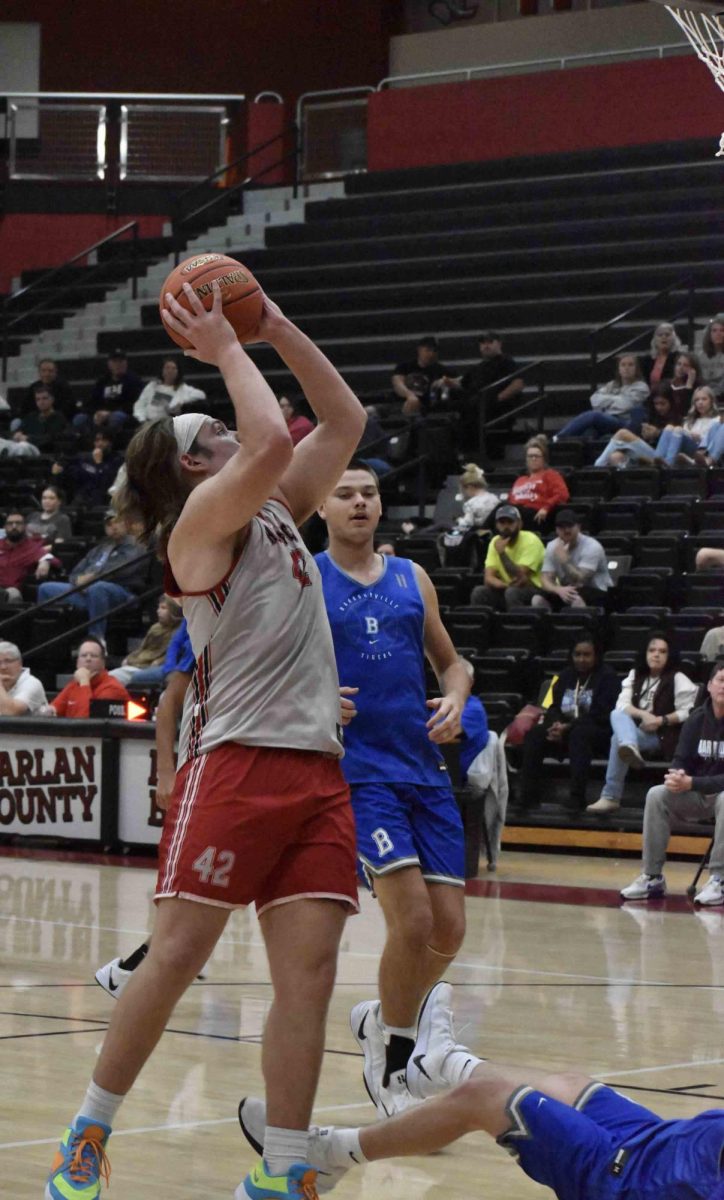 Harlan County senior center Jaycee Carter went up for a shot in scrimmage action last week. The Bears defeated Barbourville on Monday and then fell to Lyon County on Saturday in the Zip Zone Classic at Martin County.