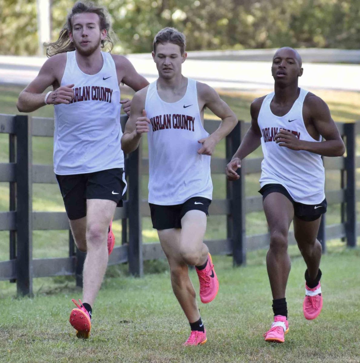 Kaden Boggs (left), Elijah Moore and Jacob Schwenke were the top three runners for Harlan County High School on Saturday in the 2A state meet as the Bears finished fifth. It was the highest finisher ever for an HCHS boys team.