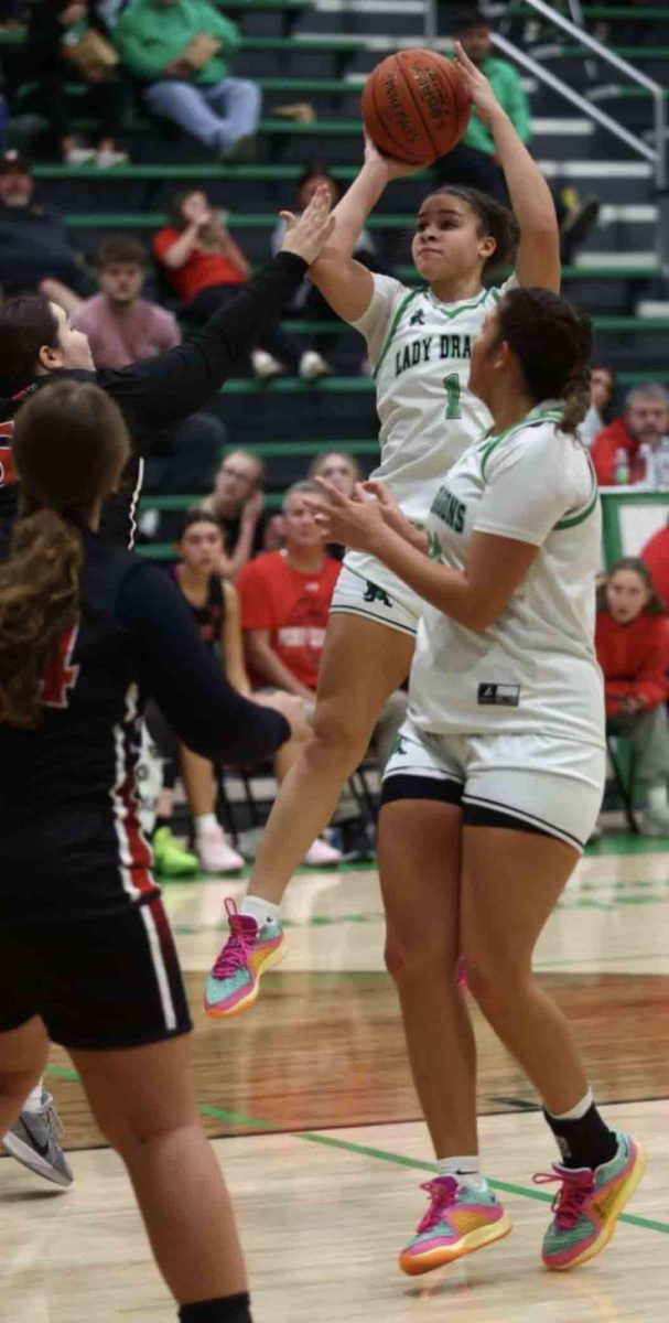 Harlan senior forward Kylie Noe scored 27 points in the Lady Dragons' 78-42 scriimmage win Wednesday over Perry Central.