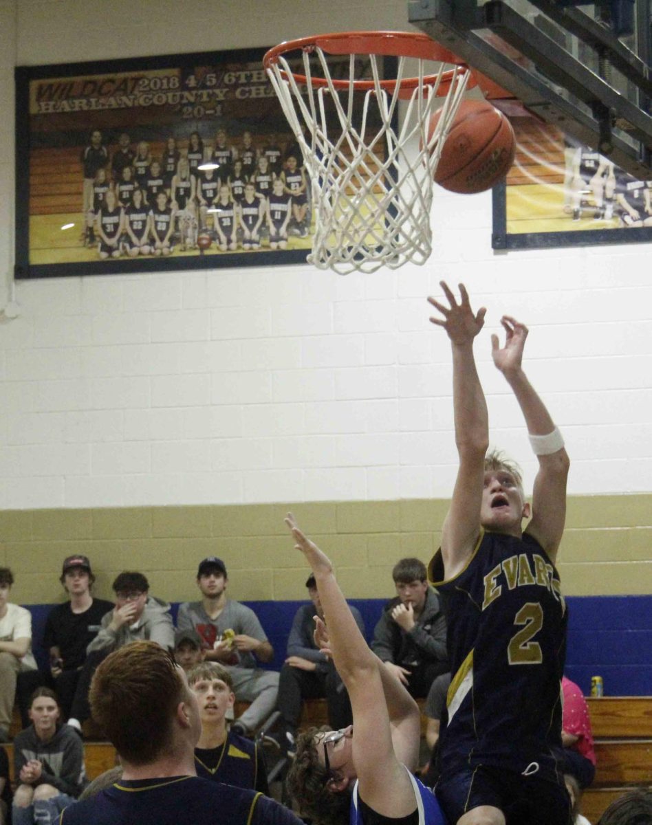 Evarts guard Cayson Farley went inside for a basket during the Wildcats' win Thursday over visiting Black Mountain. It was the first regular-season game for both teams.