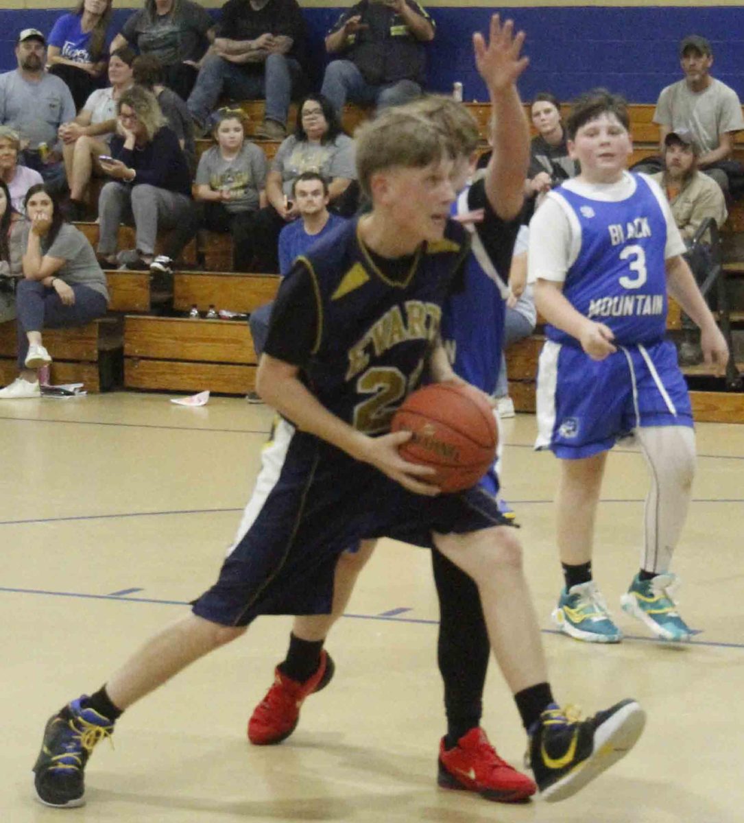 Evarts' Jacob Moore worked to the basket in action last week.