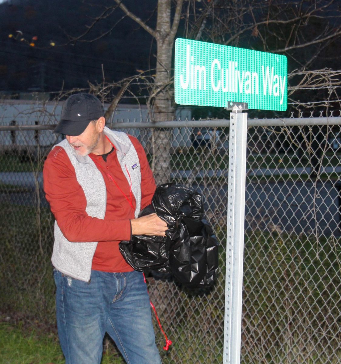 Former Cawood and Union College receiver Tim Miniard unveiled the sign marking Jim Cullivan Way at the Cawood football field.