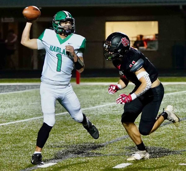 Harlan quarterback Baylor Varner threw on the move during Friday's game at South Laurel. The Green Dragons closed the regular season with a 56-0 loss.