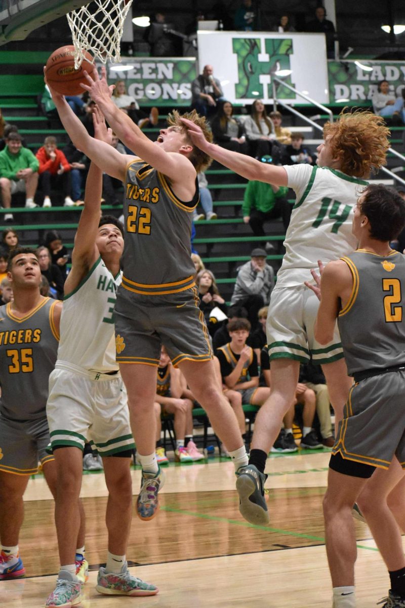 Clay County senior guard Ethan Jackson hit seven of eight shots and scored 19 points in the Tigers' win Thursday at Harlan.