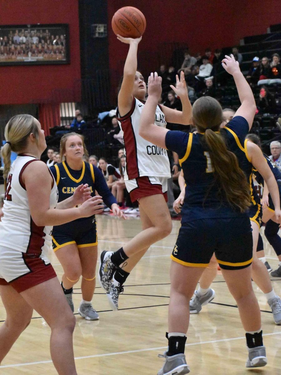 Harlan County freshman guard Kylee Runions put up a shot in the middle of the Knox Central defense in the season-opening game Tuesday.