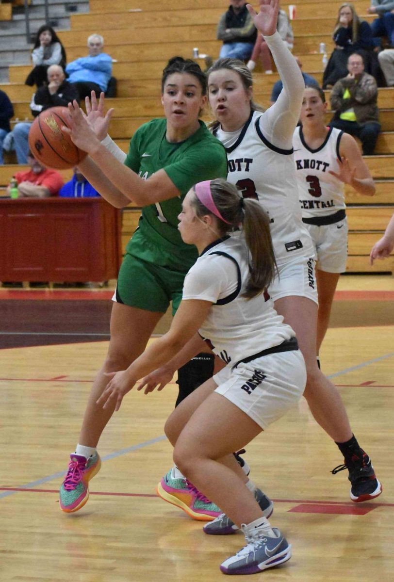 Harlan forward Kylie Noe battled through a double team to find a teammate in action from the WYMT Mountain Classic. Noe scored 20 points in the Lady Dragons' 71-47 win over Prestonsburg.