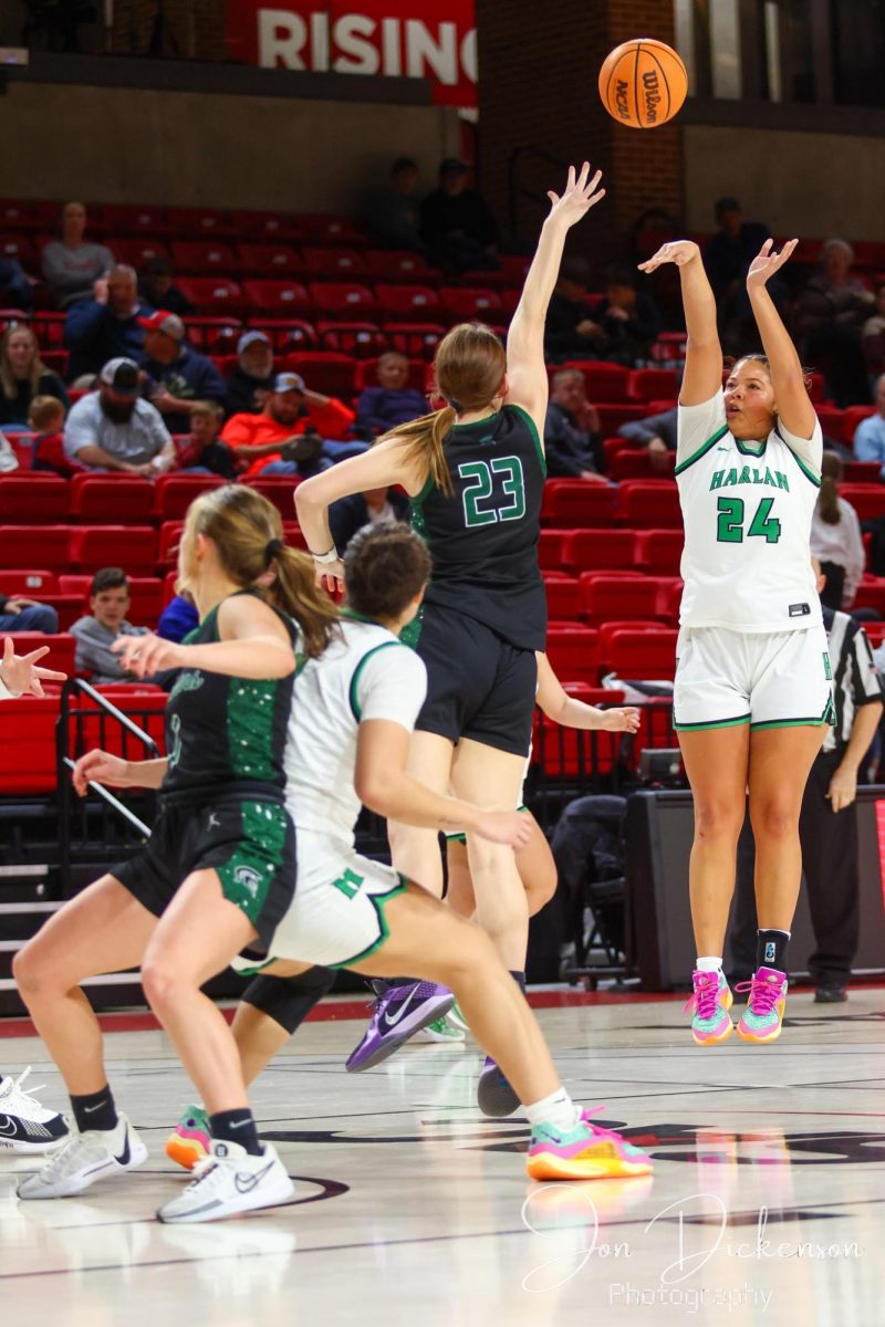 Harlan senior guard Aymanni Wynn put up a shot in action from the UVA-WIse Prep Classic last week. The Lady Dragons won two games before falling to WIse Central, Va., in the tournament finals.