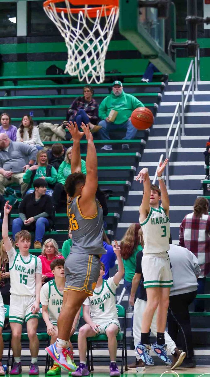 Harlan guard Izack Saylor, pictured in action earlier this season, scored 15 points Tuesday in the Dragons' 69-53 win at Lee, Va.