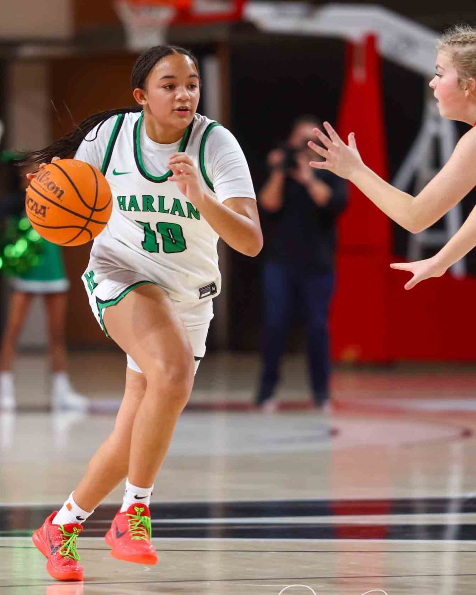 Harlan freshman guard Peyshaunce Wynn scored 31 points Saturday in the Lady Dragons' overtime loss to Russell at the Defender Classic in Lexington.