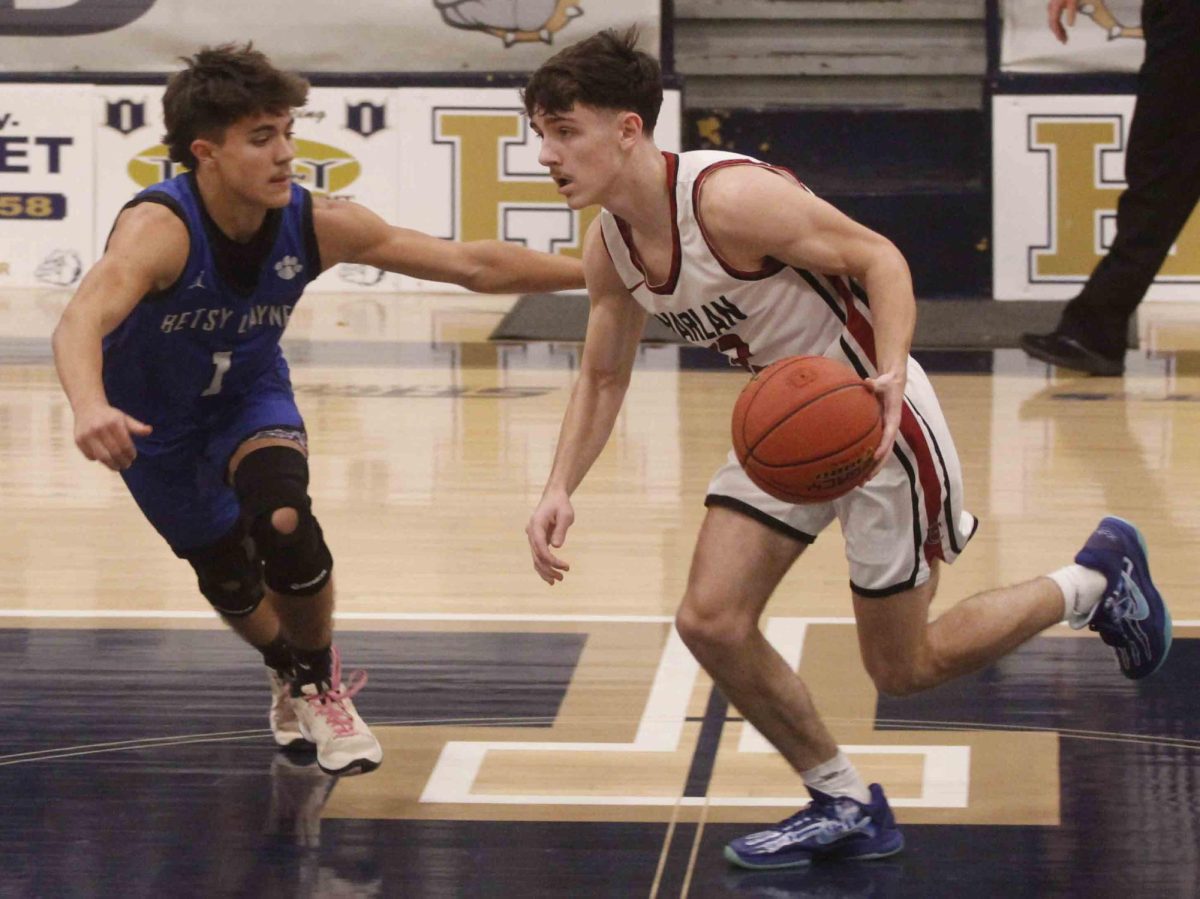 Harlan County point guard Trent Cole worked against Betsy Layne’s Canyon Hall in Saturday’s game at Hazard. Cole scored 11 points and had a big defensive game in the Bears’ 82-78 win.
