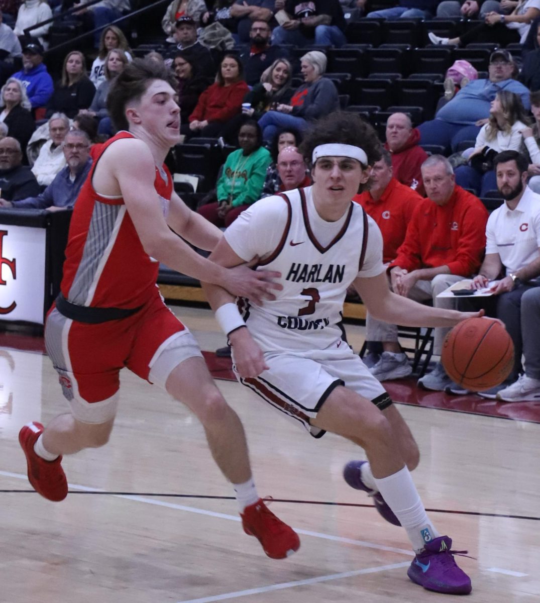 Harlan County’s Maddox Huff worked hrough the Corbin defense on the way to a 49-point night Friday as the Bears won 91-87 in a rematch of last year’s 13th Region Tournament finals.
