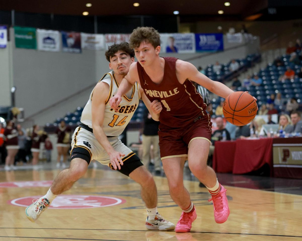 Pineville guard Ashton Moser, pictured in action at last year's regional tournament, scored 32 points over the weekend in a win over Estill County.
