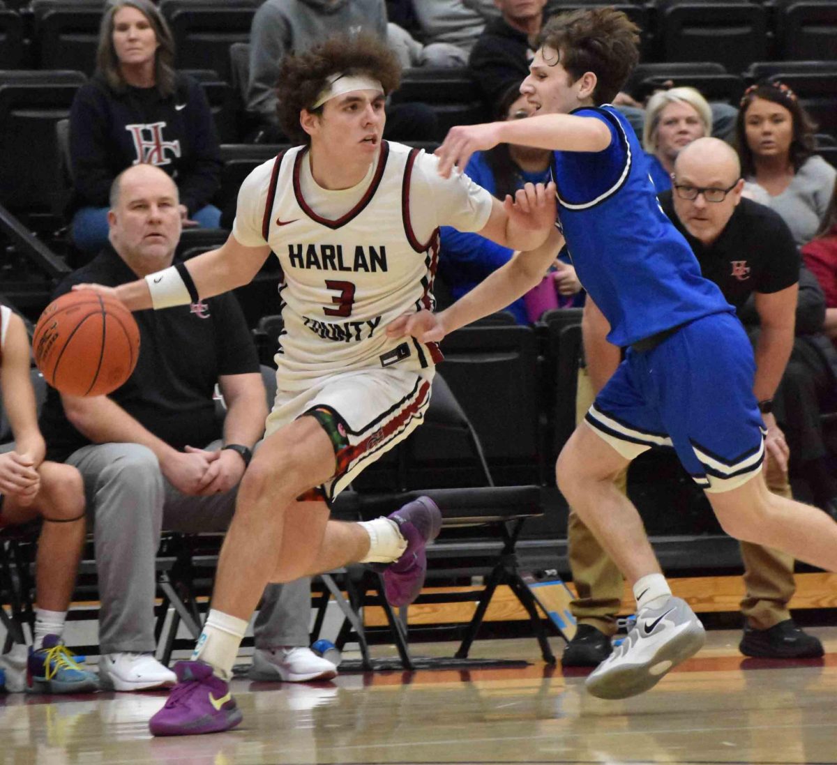 Harlan County senior guard Maddox Huff worked around a Bell County defender in action from the 2A Section 7 championship game. Huff earned tournament most valuable player honors as he scored 41 points in the Bears' 63-60 victory.