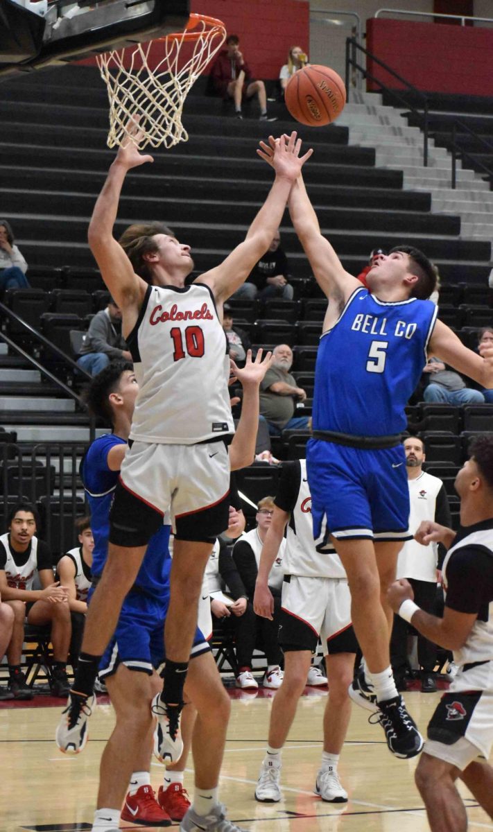 Whitley County's Aaron Rowe and Bell County's Blake Burnett battled for a rebound in action from the 2A Section 7 Tournament. Burnett scored 15 points in the Bobcats' 63-58 win.