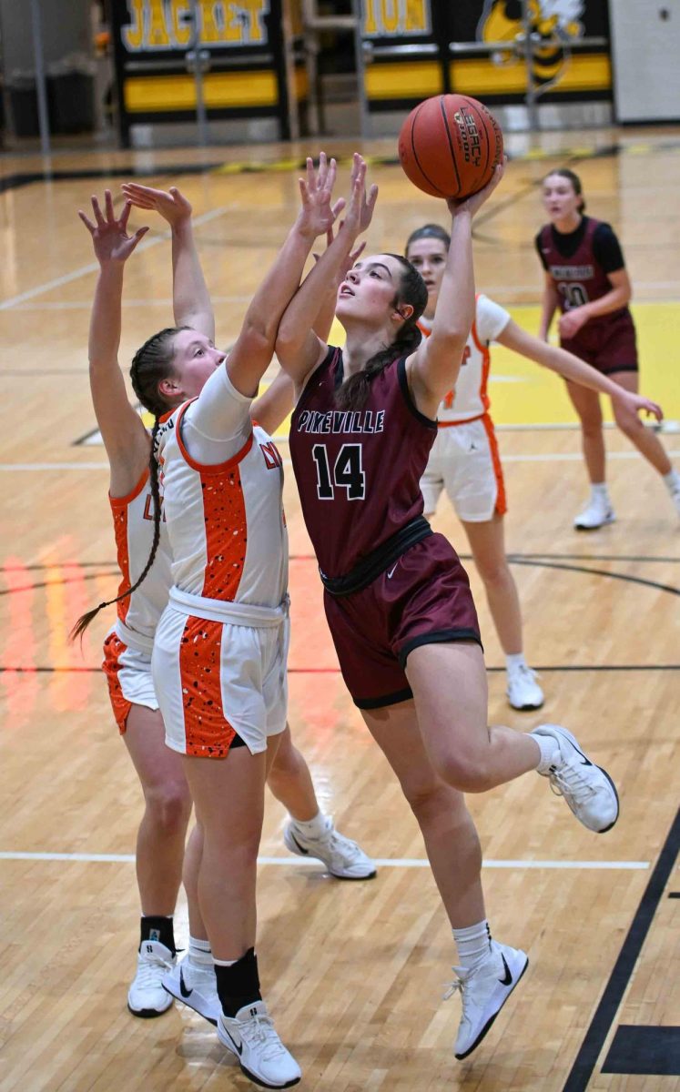 Pineville junior forward Rachel Howard worked inside for a basket during the Lady Lions 71-42 win over Lynn Camp in the 13th Region All "A" Classic quarterfinals. Howard reached the 1,000-point mark for her career with a basket in the second quarter.
