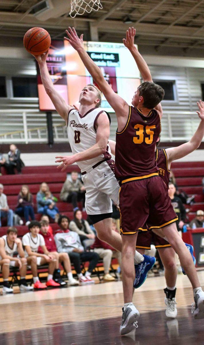 Pineville senior guard Sawyer Thompson, pictured in action earlier this season, finished with 19 points, 17 rebounds, and 13 assists to lead the Lions past Bishop Brossart in the first round of the state All "A" Classic on Thursday in Owensboro.