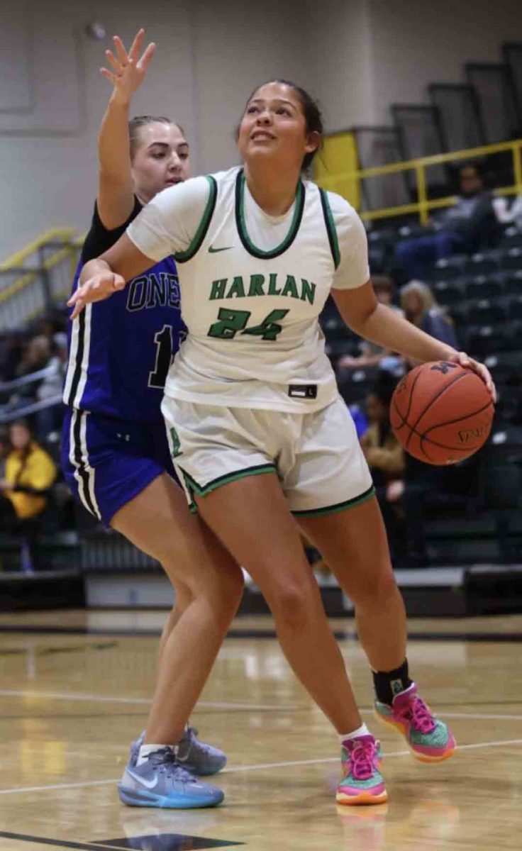 Harlan senior guard Aymanni Wynn worked to the basket for two of her 15 points Sunday in the Lady Dragons' 75-10 rout of Oneida Baptist in the 13th Region All "A" Classic at Middlesboro.