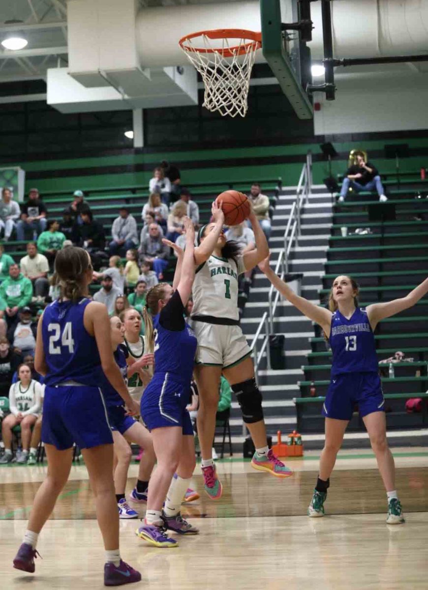 Harlan senior forward Kylie Noe worked inside for two of her 24 points in the Lady Dragons' 77-54 win Friday over visiting Barbourville.