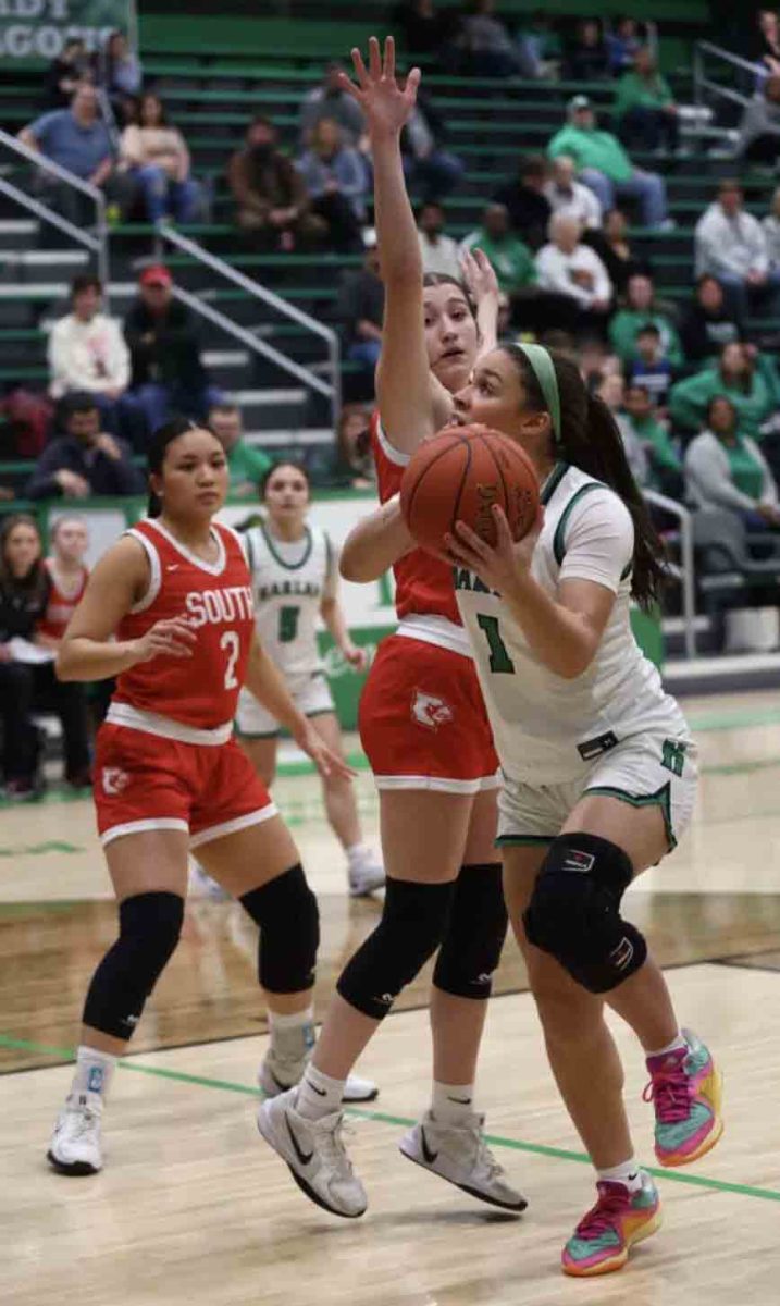 Harlan’s Kylie Noe went up for two of her team-high 16 points in the Lady Dragons’ 51-40 loss to visiting South Laurel.