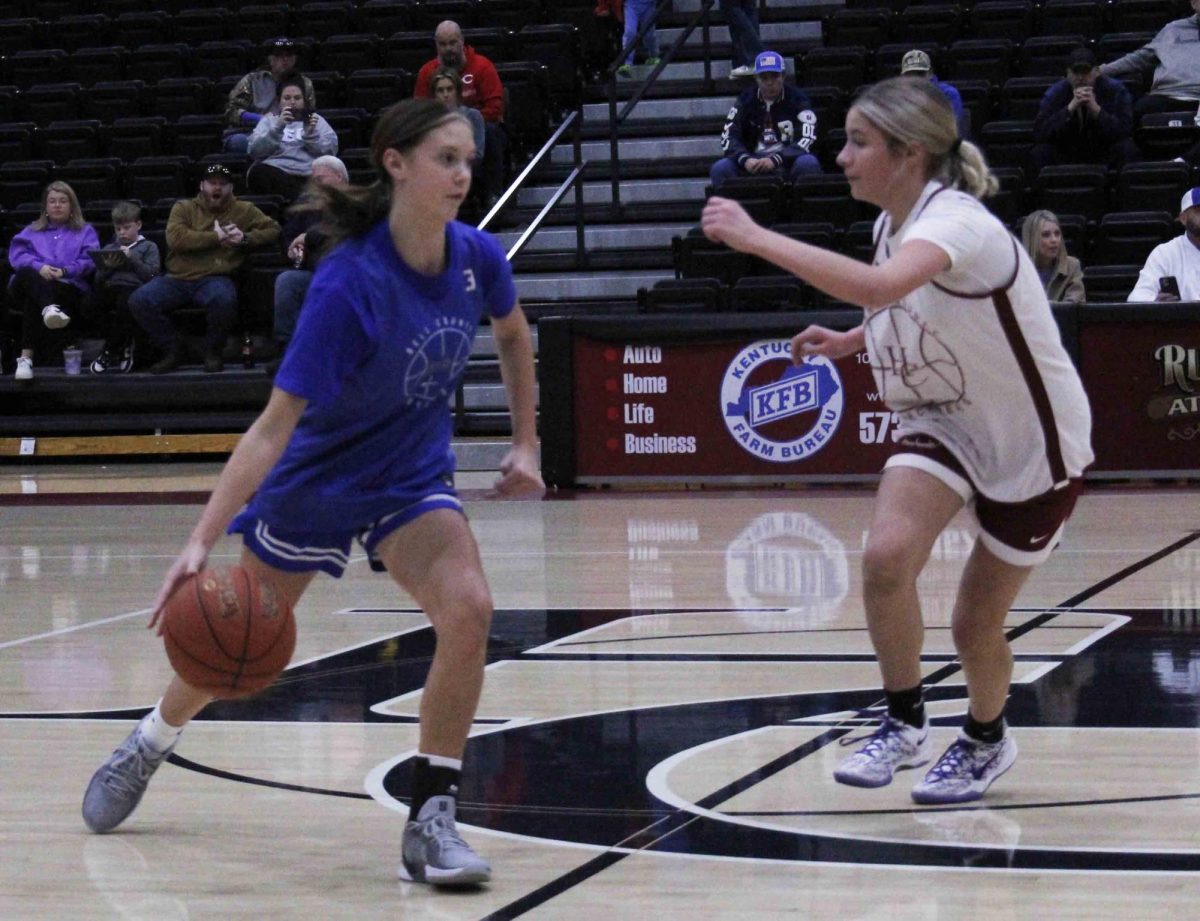 Bell County's Bristol Jordan brought the ball down court against Harlan County's Kenadee Sturgill in action earlier this season. Sturgill scored six points as the Lady Bears won 31-25 in a freshman game last week. Jordan led Bell County with 14 points.