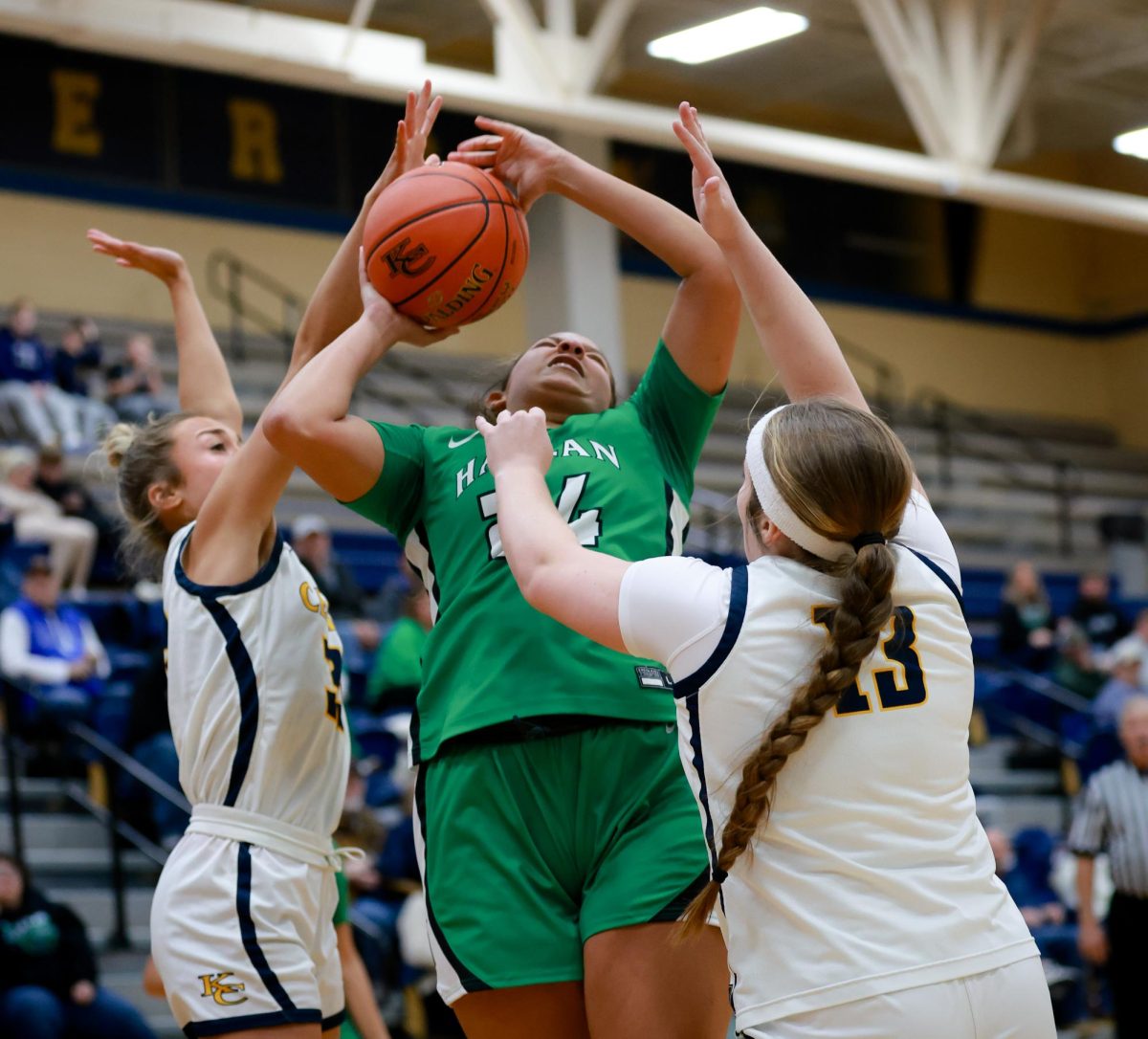 Harlan senior guard Aymanni Wynn battled between two Knox Central defenders for a shot in Saturday's Wynn led the Lady Dragons with 18 points in a 90-61 loss.