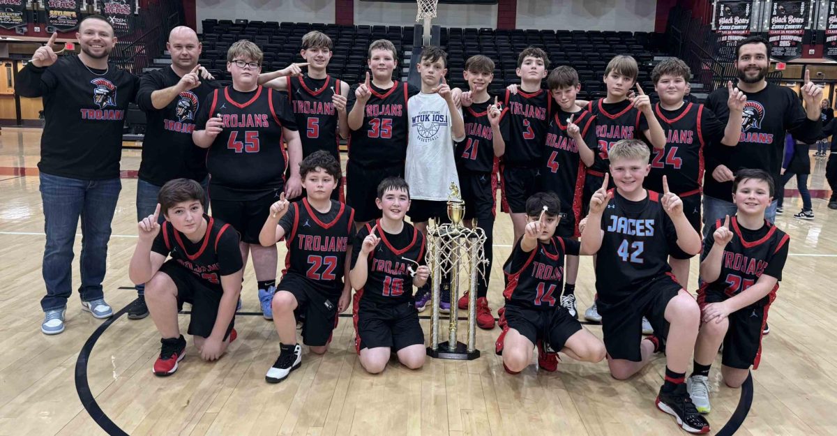 The James A.. Cawood Trojans won the first fifth- and sixth-grade county tournament title with a 54-46 win Saturday over Wallins at Harlan County High School. Team members include, from left, front row: Kaiden Hensley, Layden Brock, Seth Johnson, Mark Sargent, Mason Rhymer and Evan Coldiron; back row: coach Ryan Clem, coach Steven Johnson, Evan Daniels, Logan Mills, Brylee Southerland, Tucker Daniels, Tanner Daniels, Brantley Burkhart, Cameron Chappell, Carson Kazy, Matthew Ledford and coach Chris Southerland; not pictured Kasen Ely.