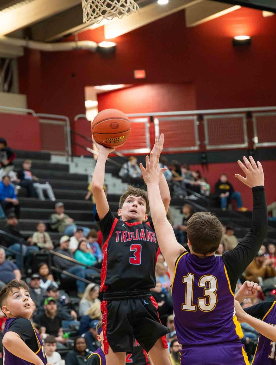 James A. Cawood guard Brantley Burkhart put up a shot during the fifth- and sixth-grade county championship game Saturday.