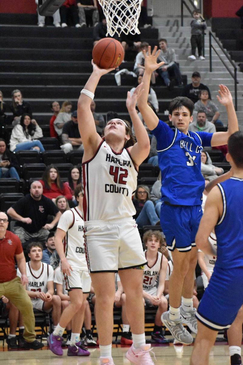 Harlan County senior center Jaycee Carter, pictured in action earlier this season, hit seven of 11 shots and scored 14 points in the Bears' 70-58 loss to top-ranked Frederick Douglass.