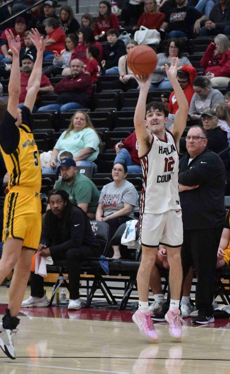 Harlan County guard Trent Cole, pictured in action earlier this season, hit four 3-pointers Wednesday and scored 12 points in the Bears' 74-23 win at Middlesboro.