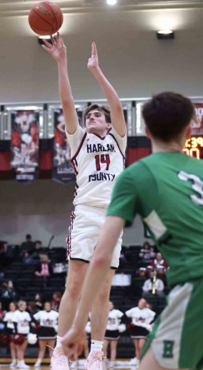 Harlan County senior guard Brody Napier released a shot on Firday during the Bears' 73-21 win over visiting Harlan.