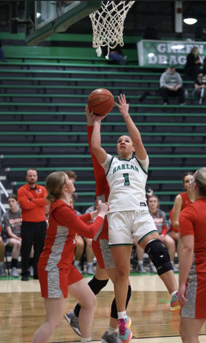 Harlan senior forward Kylie Noe worked inside for two of her 15 points in the Lady Dragons' 74-42 win.