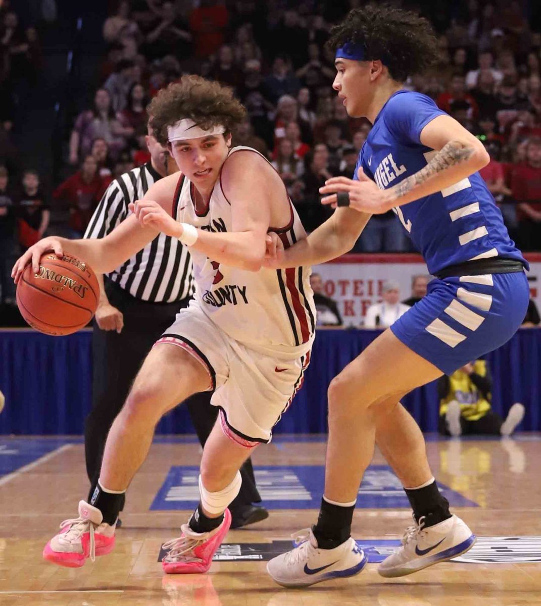 Harlan County guard Maddox Huff worked against an Evangel defender in last year's Sweet Sixteen semifinals. Huff helped lead the Bears to a state runner-up finish last year and is among the state leaders in scoring this year at 29.8 points per game for the 17-7 Bears.