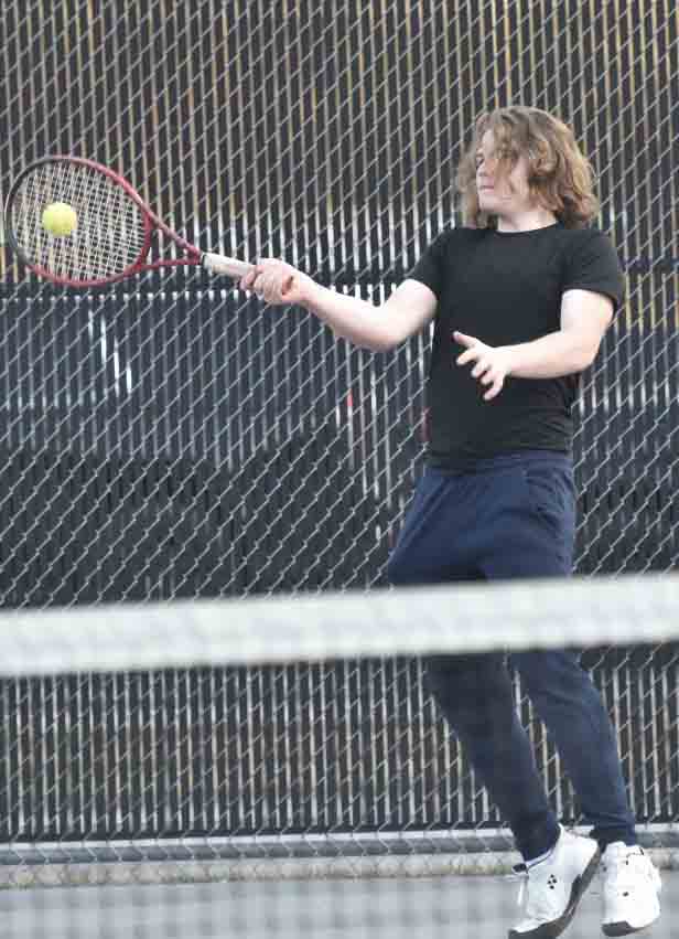 Harlan County’s Josh Stewart, a junior, won in both singles and doubles on Thursday against Pineville.
