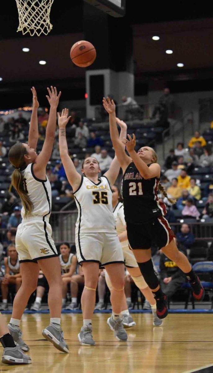 Harlan County guard Taylynn Napier worked inside for a shot in 13th Region Tournament action Monday.