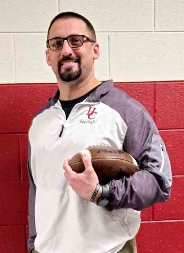 Eddie Creech, the former football coach at Harlan County High School, has been selected to lead the district's middle school program.